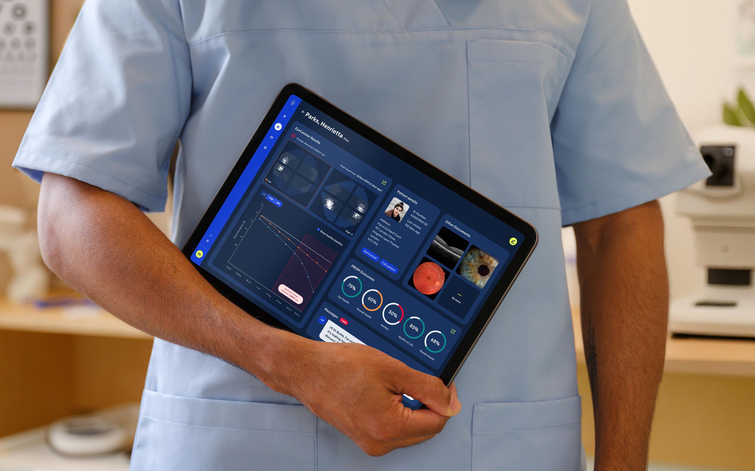 Tablet displaying user interface held by a person