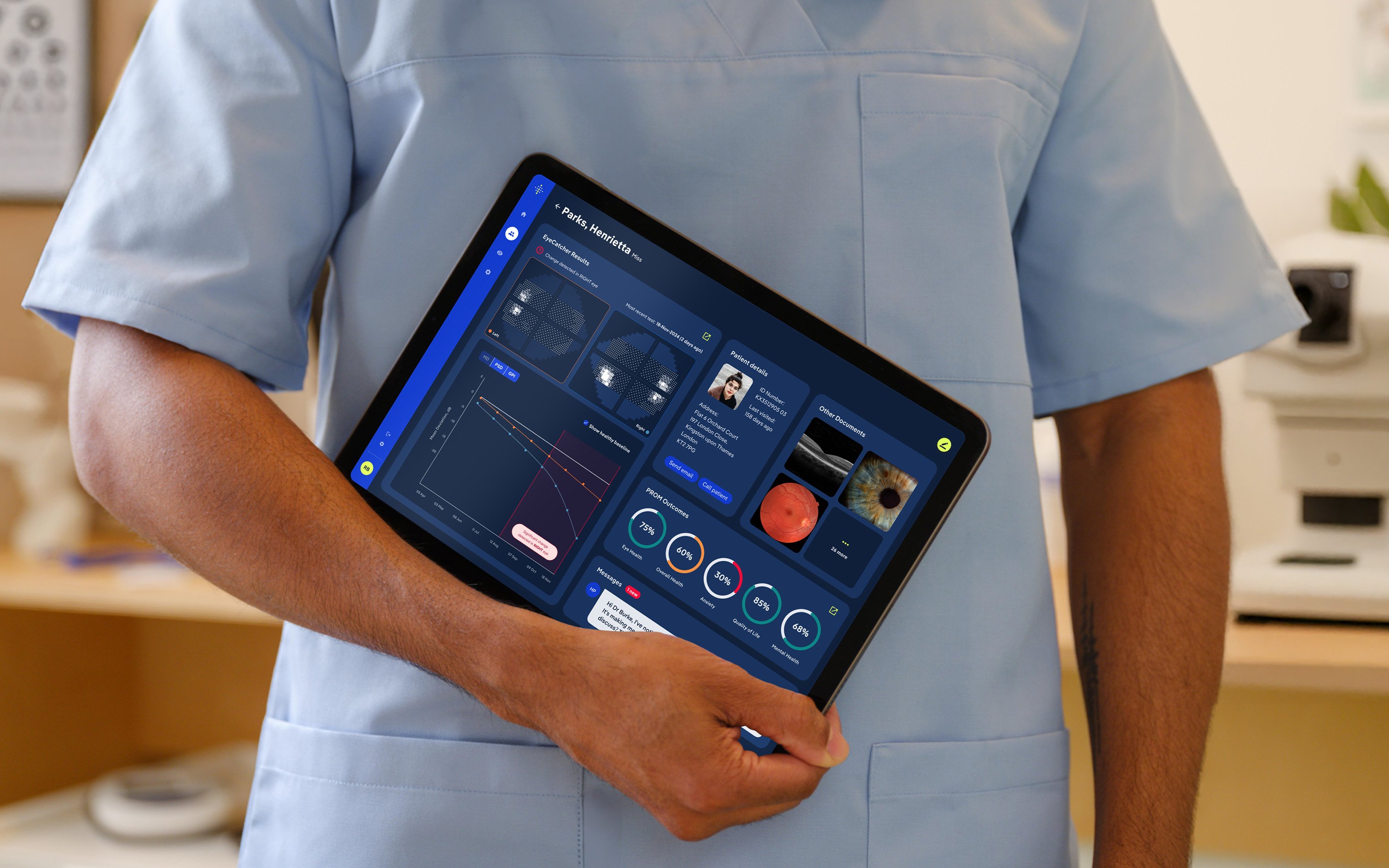 Tablet displaying user interface held by a person