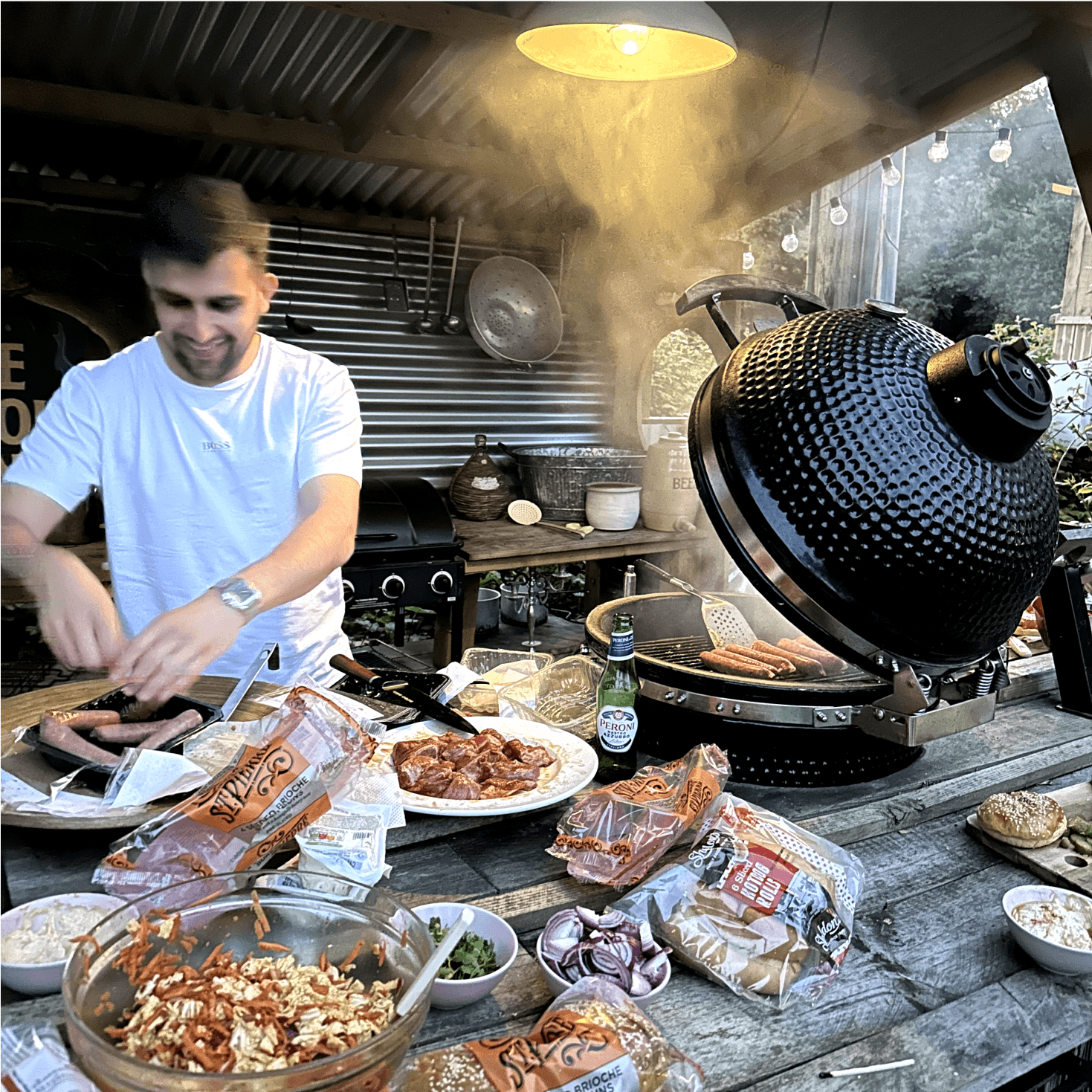 Member of the team doing a barbecue
